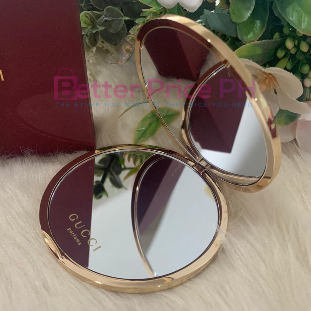 Promotional compact mirror as a GWP by Gucci