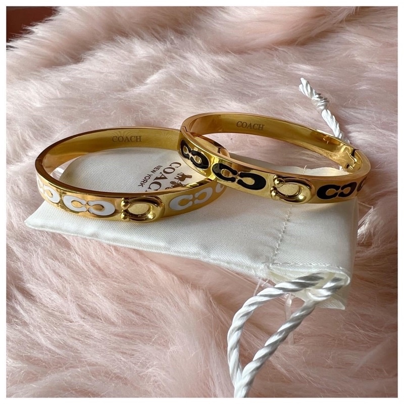 Horse And Carriage Bangle | COACH OUTLET | Bangles, Jewelry lookbook,  Silver bracelets for women