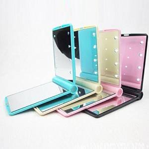 small mirror with lights