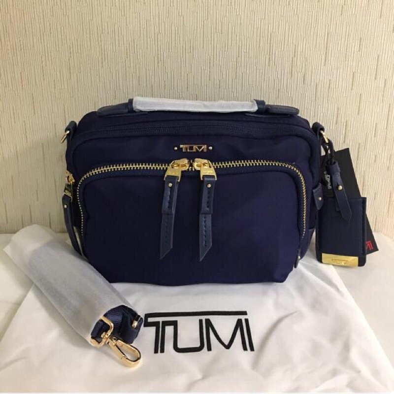 Tumi sling hot sale bag ladies